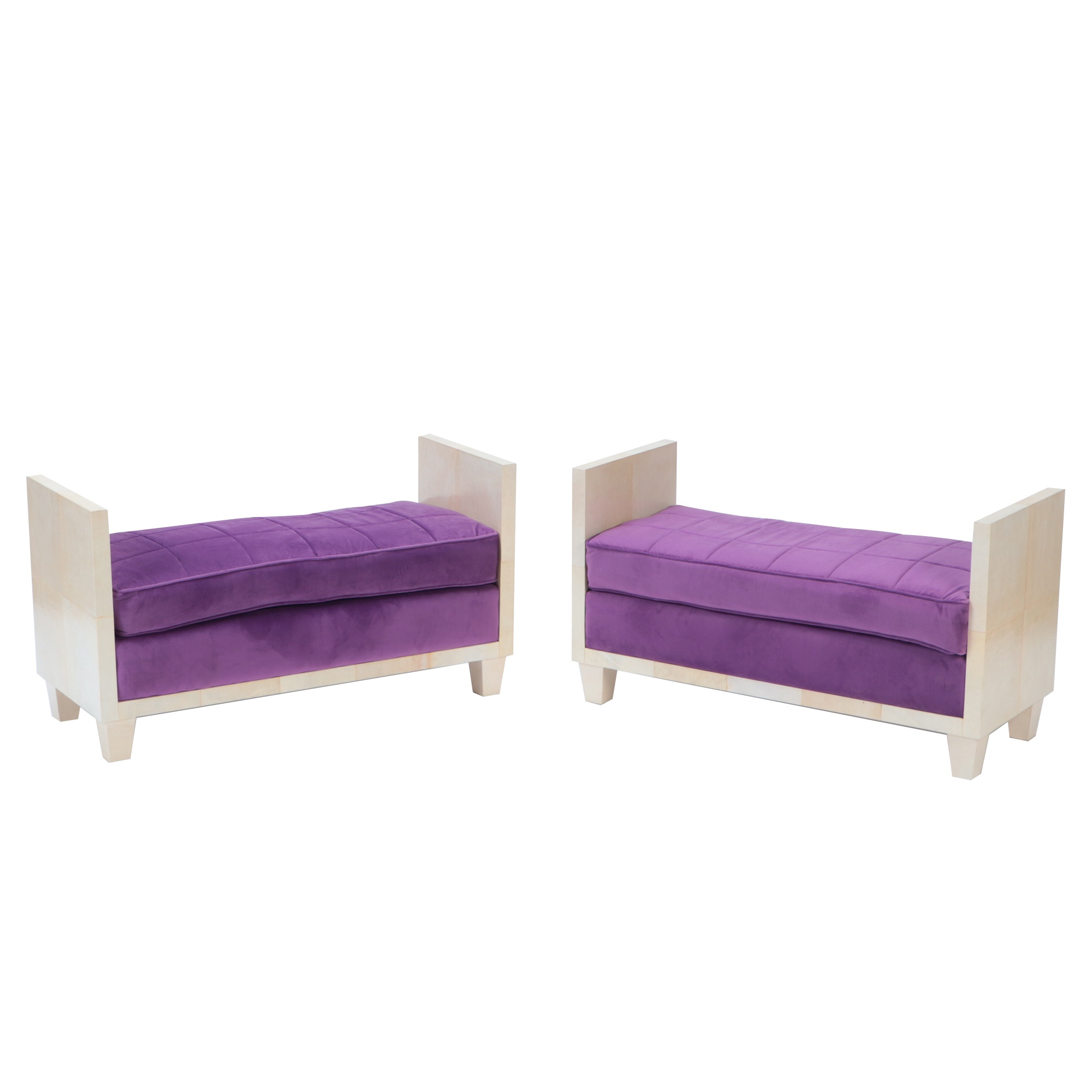 A pair of parchment upholstered benches in the manner of Jean-Michel Frank. Contemporary