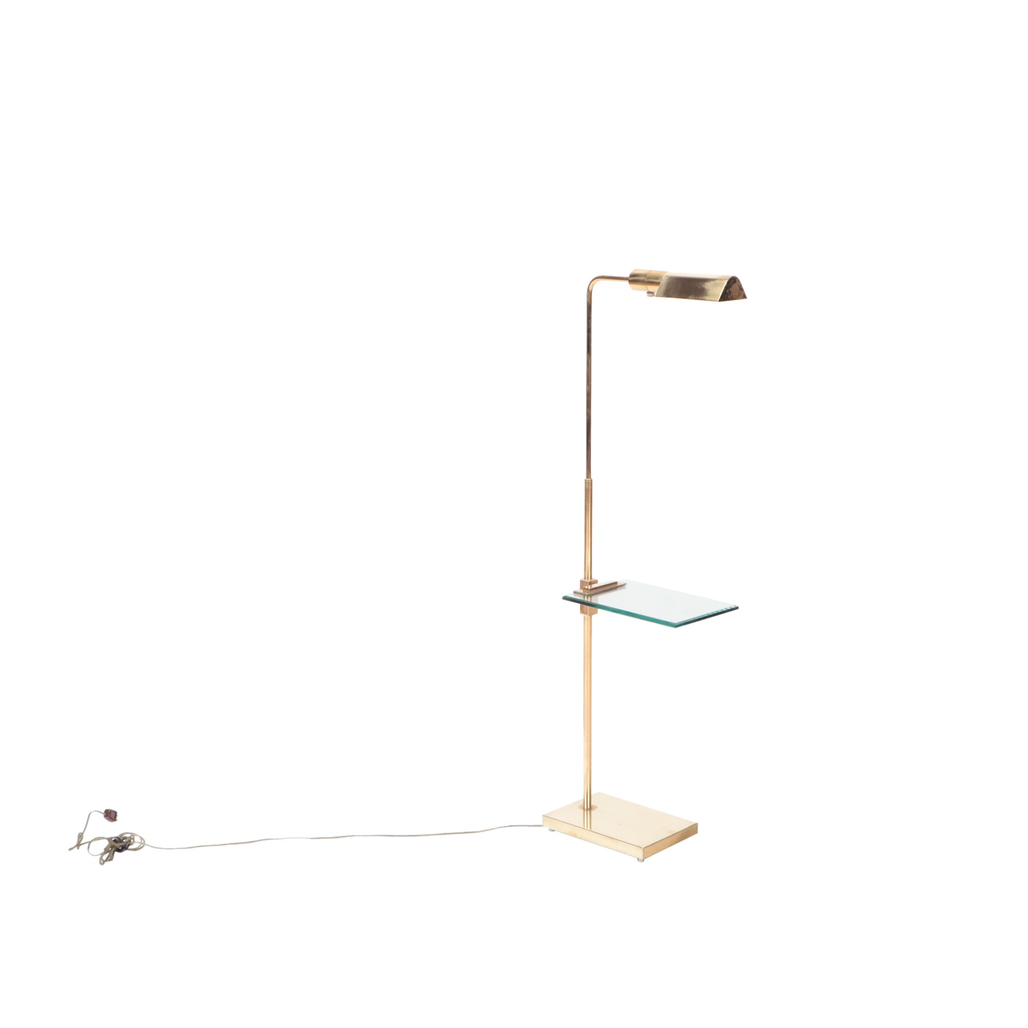A brass and glass adjustable floor lamp, C. 1970.