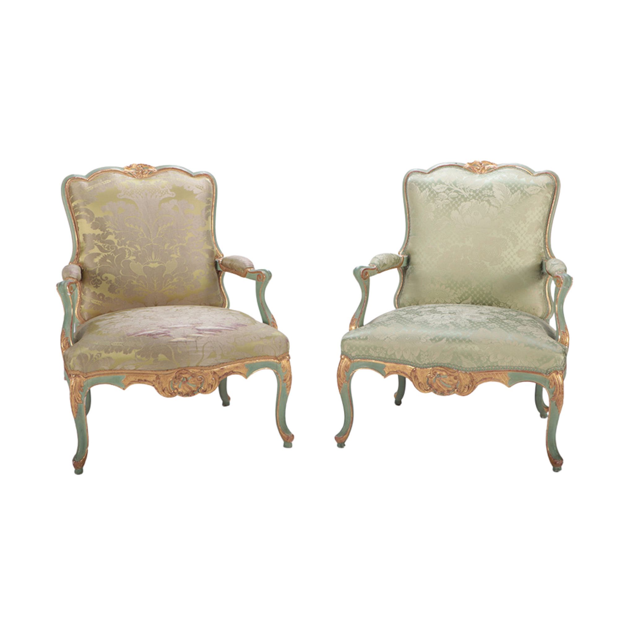 A pair of French Louis XV style painted and gilt open armchairs, 19th C 