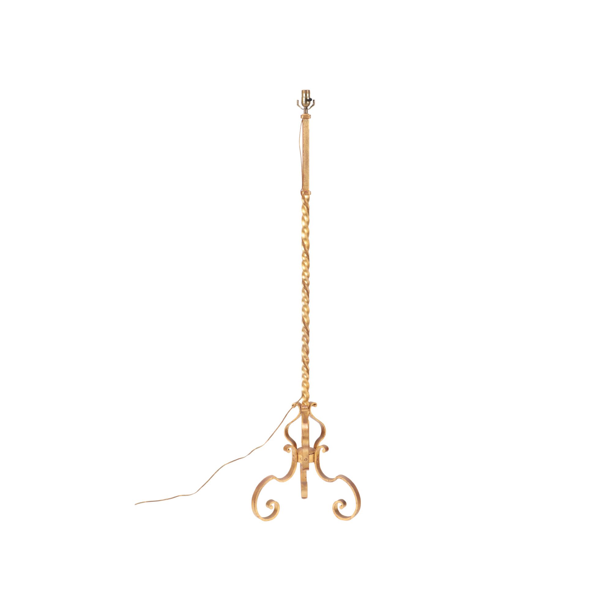 A French gilt iron floor lamp, in the manner of Raymond Subes, C. 1940.