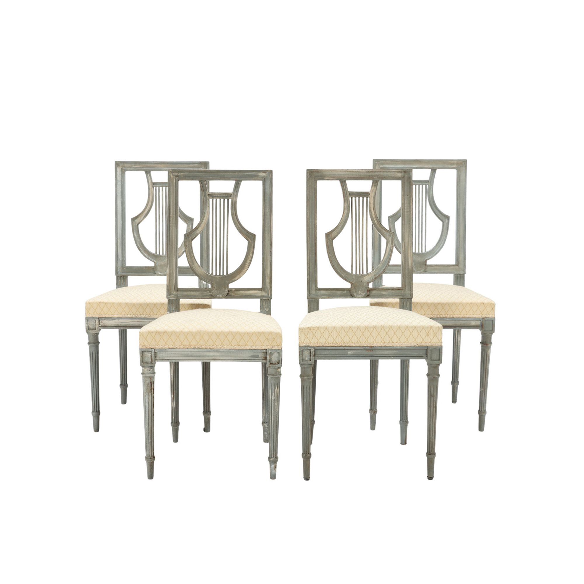 A set of four French Louis XVI style painted chairs. Lyre model. C.1900