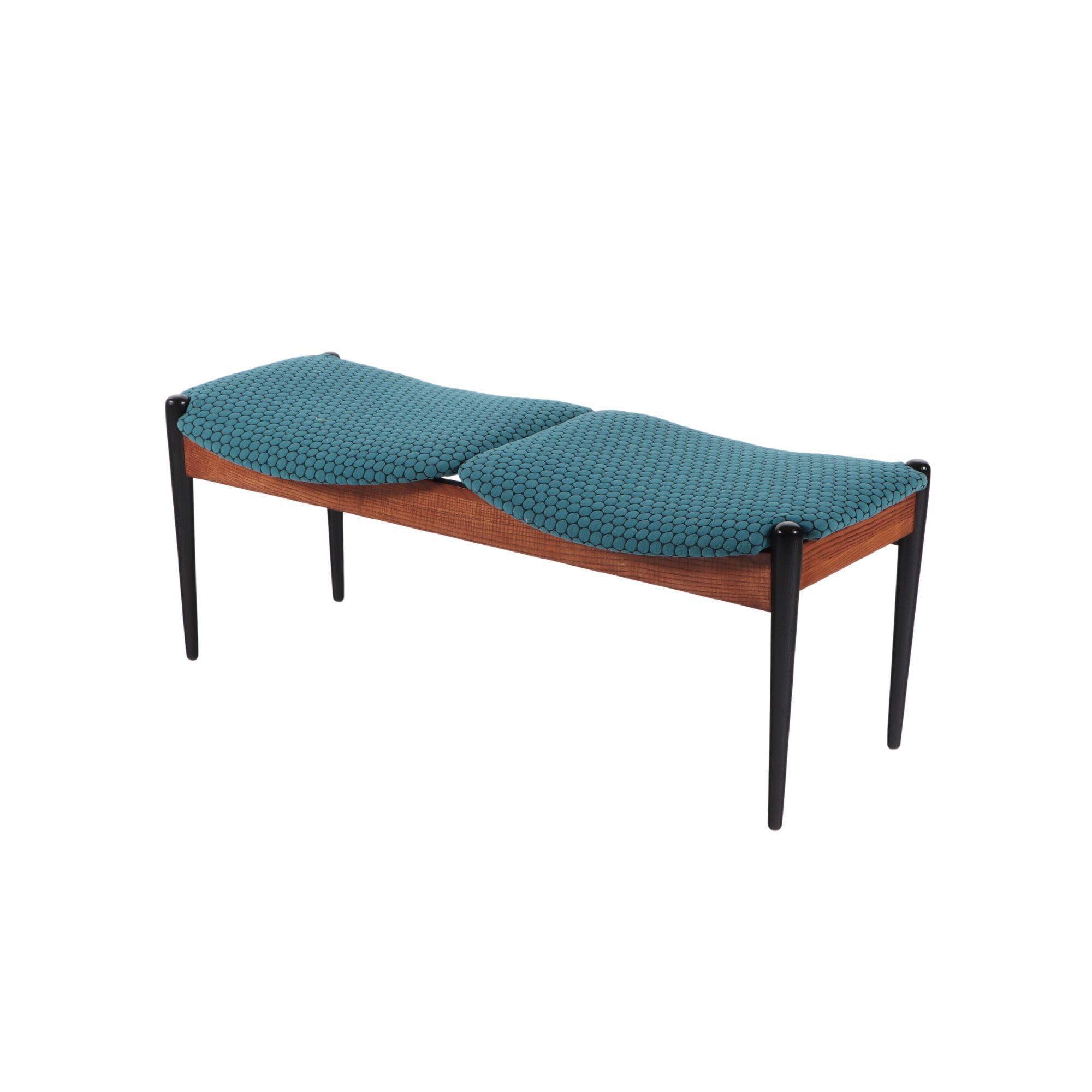A mid century modern Arthur Umanoff two seat walnut bench circa 1950.