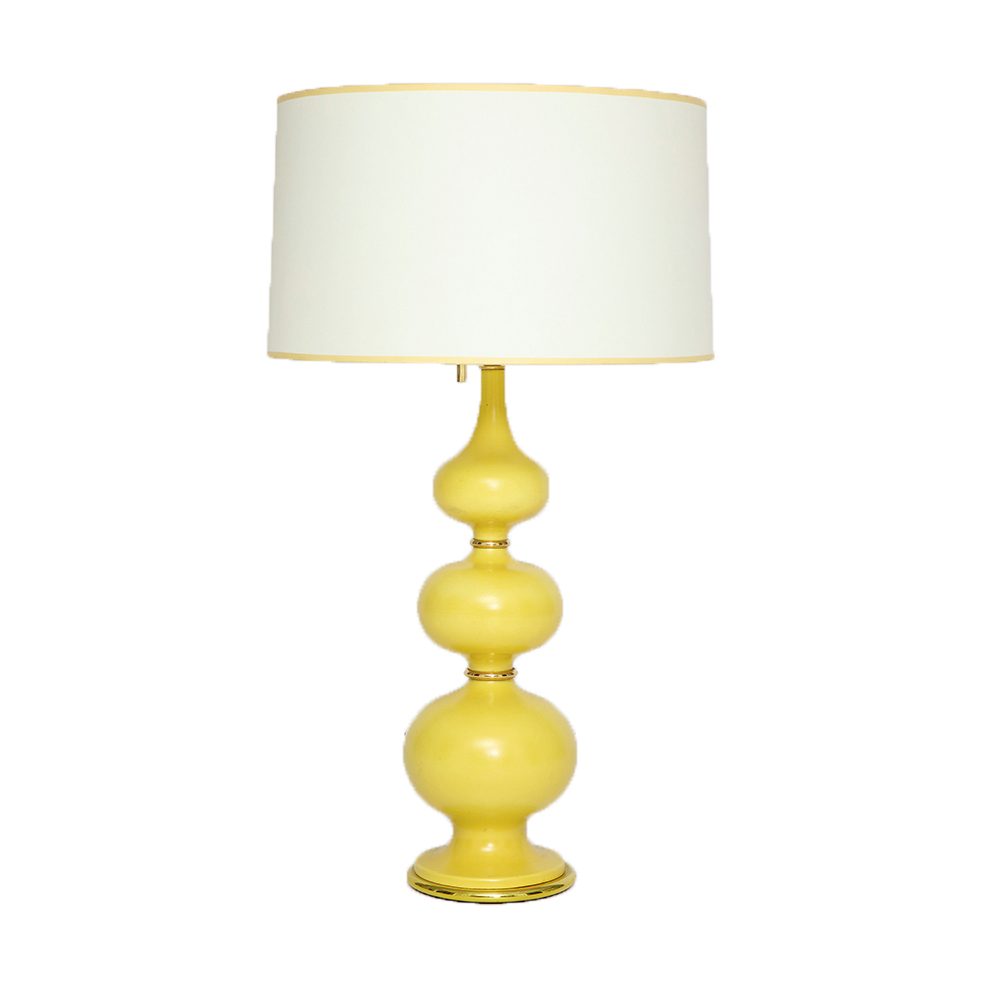 A Mid Century Modern atomic lamp by Gerald Thurston for Lightolier.