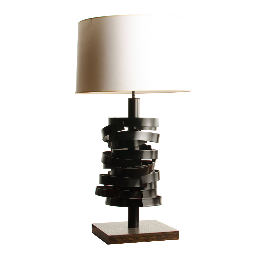 A sculptural modernist table lamp by Leonard Mendoza.