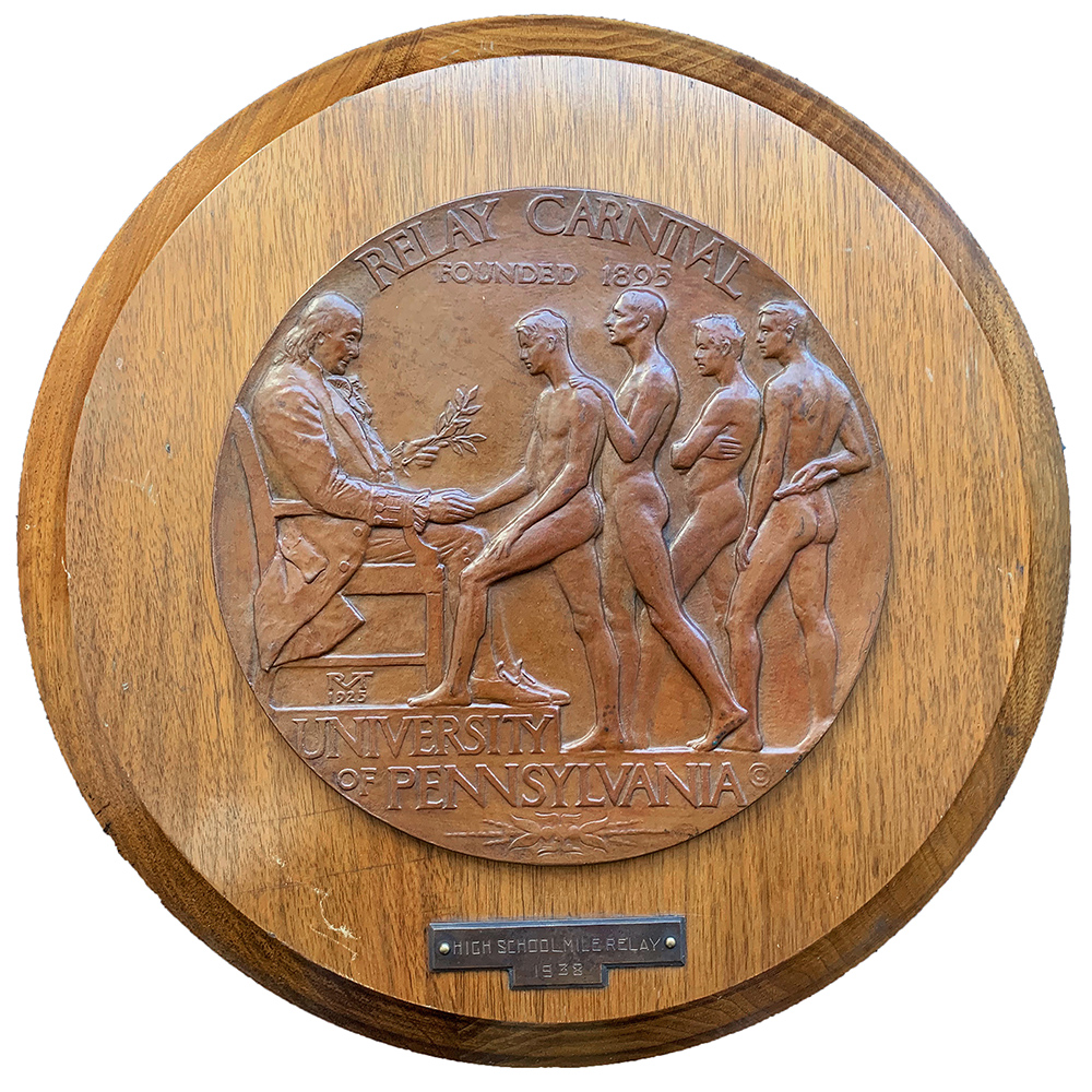 Penn Relays wooden plaque by Robert Tait McKenzie (American, b. 1867 - d. 1938).