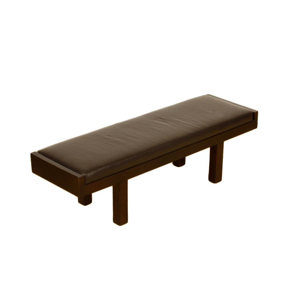 Baker Manhattan bench upholstered in Coach leather. 