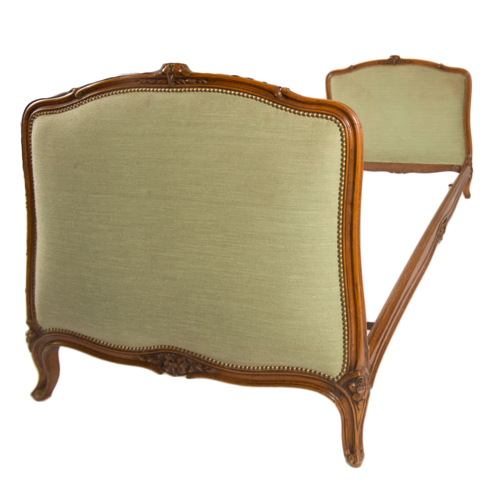 A French Louis XV style day bed with upholstered headboard and footboard circa 1930.