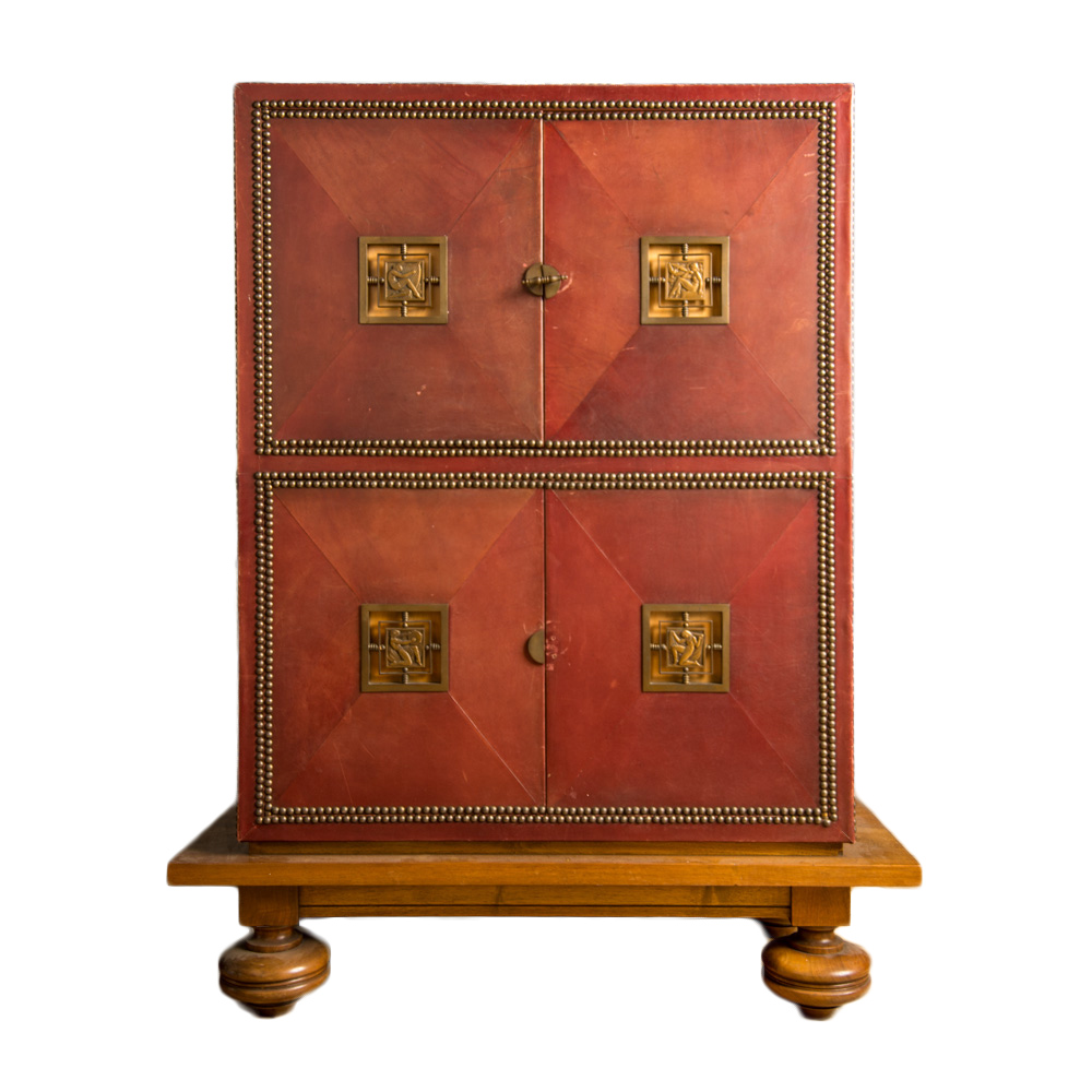 Art Deco cabinet in deep red leather, with bronze mounts by Marcel Claude Renard, France, circa 1930s.