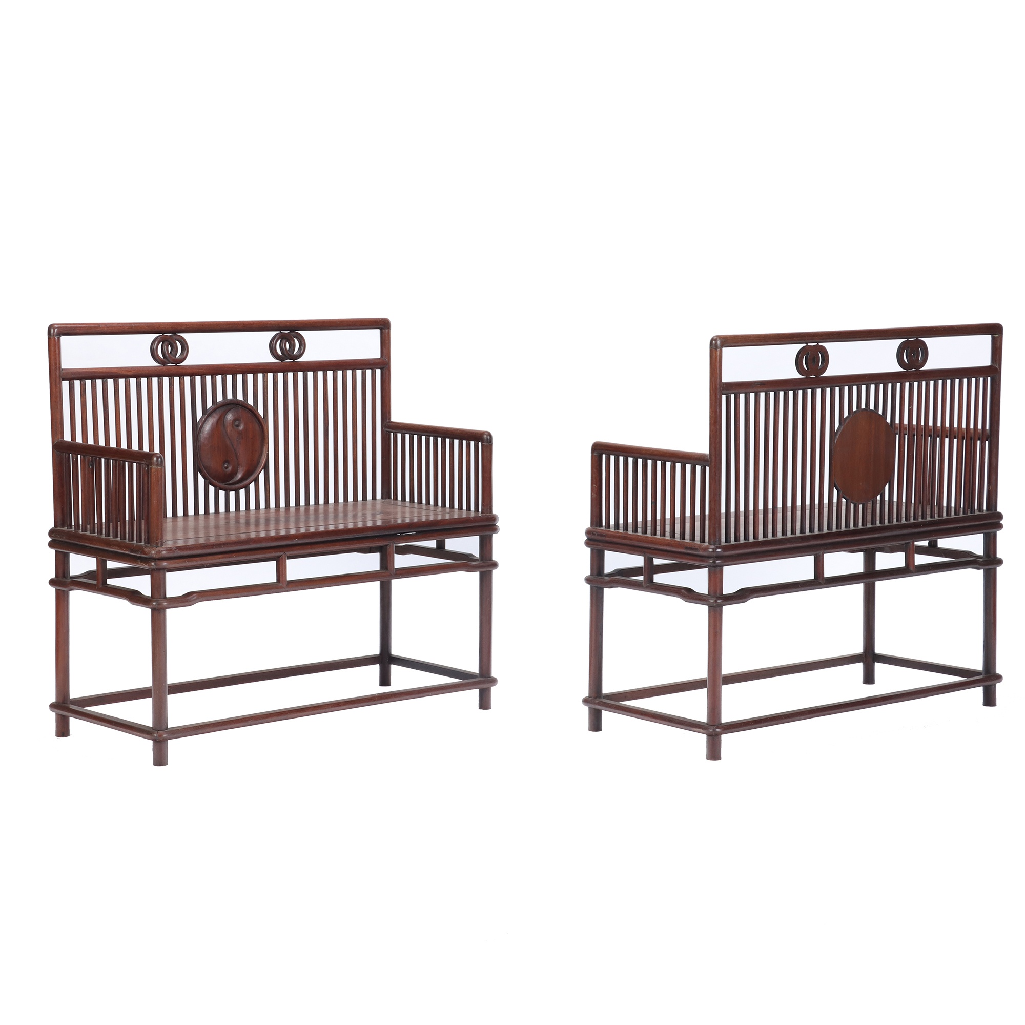A pair of Chinese Huanghuali hardwood benches, early 20th C.