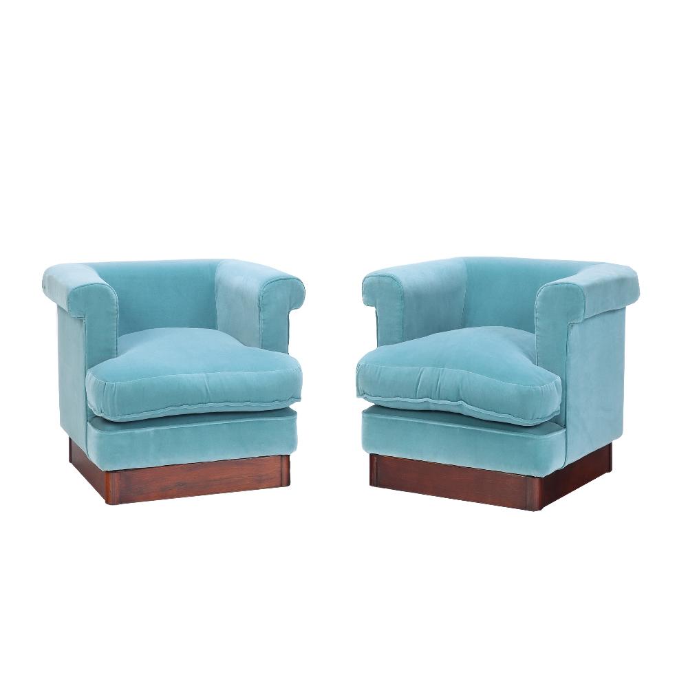 A pair of Italian blue velvet upholstered cube club chairs. Circa