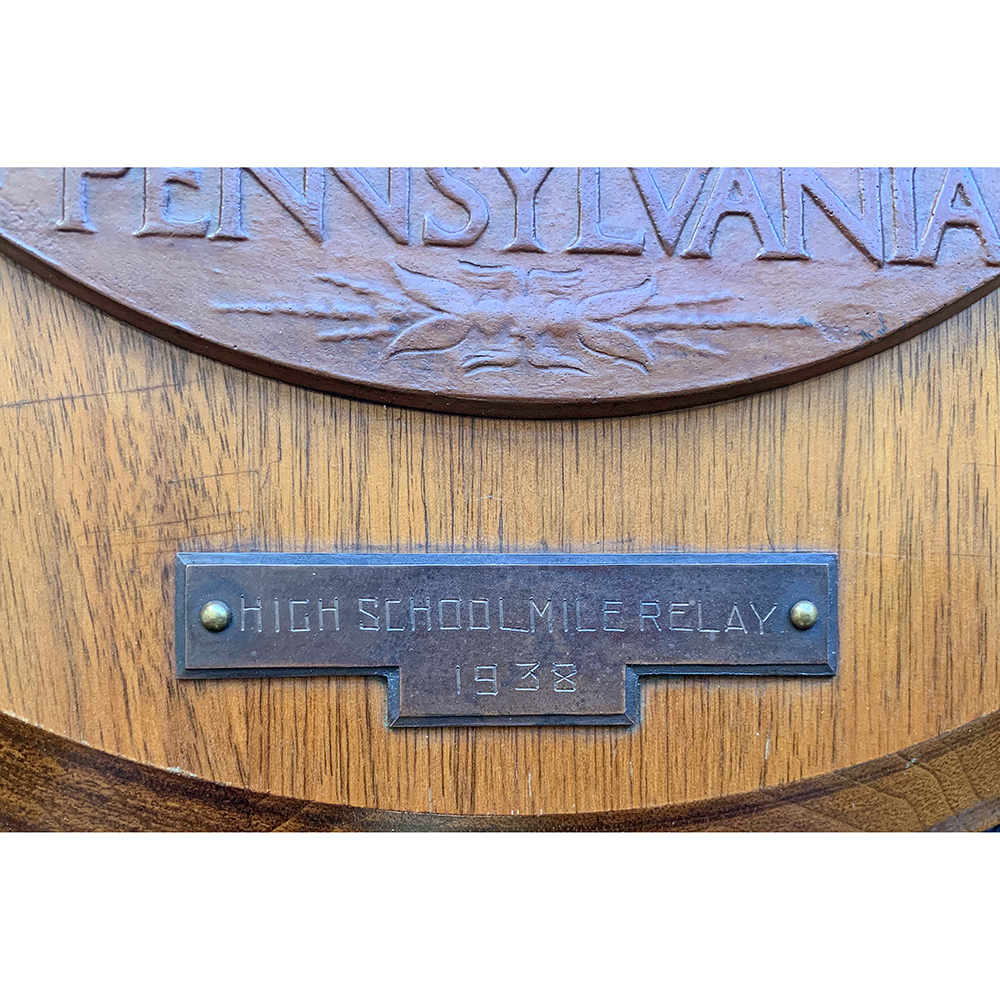Penn Relays wooden plaque by Robert Tait McKenzie